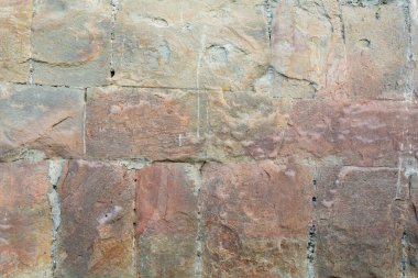 Taştan arka plan duvarı. Duvar kağıdı büyük kaldırım taşları.