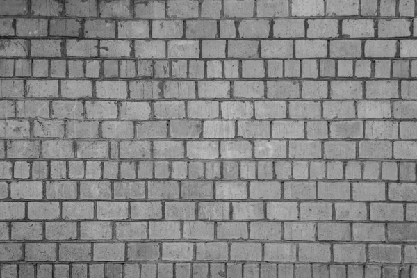 Bloklardan oluşan arka plan duvarı. Duvar kağıdı büyük tuğlalar.