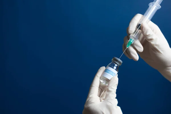 Éléments de vaccination avec fond bleu. — Photo