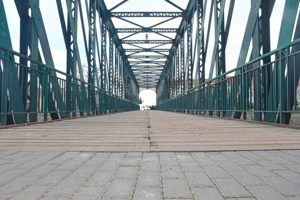 Old metal overpass, bridge over the river. Rivet metal bridge in town. Breclav, Czechia — Stock Photo, Image