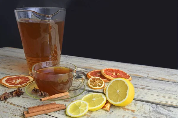 Glass Cup Black Tea Cinnamon Sticks Anise Star Lemon Dried — Stockfoto