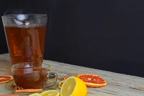 Glass Cup Black Tea Cinnamon Sticks Anise Star Lemon Dried — Stok fotoğraf