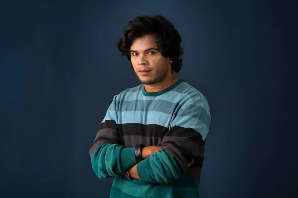Portrait Happy Indian Young Man Arms Crossed Dark Background — Photo