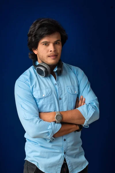Portrait Handsome Young Man Enjoying Music Headphones Blue Background — Stockfoto