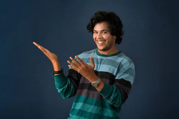 Portrait Successful Cheerful Young Man Pointing Presenting Something Hand Finger — Foto de Stock