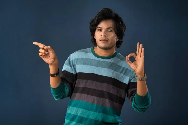 Portrait Successful Cheerful Young Man Pointing Presenting Something Hand Finger — ストック写真