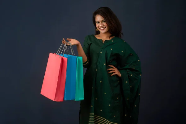 Beautiful Indian Young Girl Woman Holding Posing Shopping Bags Dark — Stockfoto