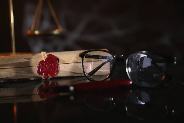 Document with wax seal, scales and antique stamp on a desk. Last will and legacy concept — Stockfoto