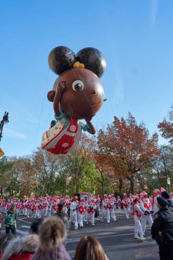 Manhattan, USA - 24. November 2021: Ada Twist Balloon shown at the Thanksgiving Parade in New York City. People enjoying Macy's Parade