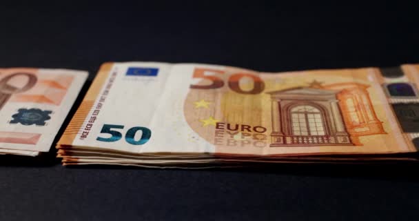 堆积起来的50欧元钞票 新旧设计的50欧元钞票 — 图库视频影像