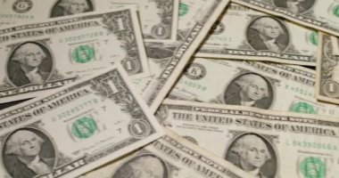 Bir dolarlık banknotlar. 1 dolarlık banknotların kalıbı. Dönen arkaplan