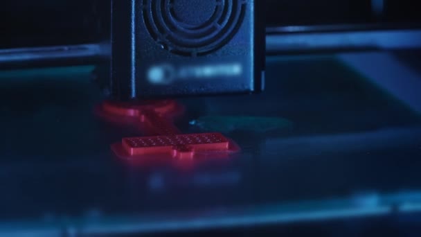 3D printer prints a red model — Stock videók