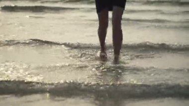 young white girl runs on the water