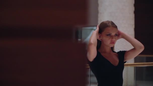 Woman in a black evening dress — Stock Video