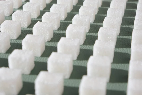 Raffinerat Socker Grön Bakgrund Kuber Sött Och Vitt Socker Geometrisk — Stockfoto