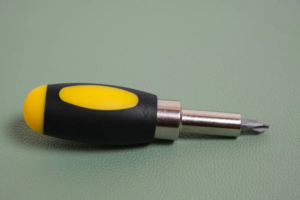 Screwdriver Green Background — Stock Photo, Image