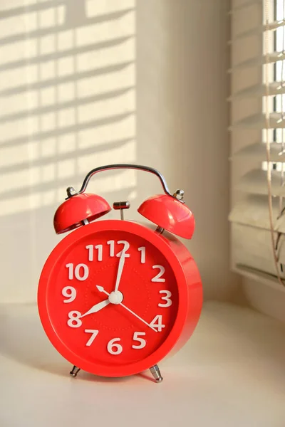 Red Alarm Clock Early Morning Windowsill Rays Sun — Stock Photo, Image