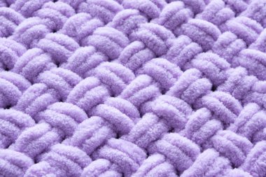 Arka plan örülmüş battaniye, el yapımı, leylak rengi.