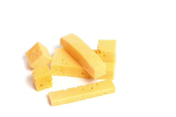 白い背景にスライスしたチーズのスライス — ストック写真