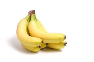 Beyaz zemin üzerinde olgun sarı muzlar, izole