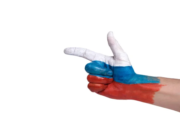 形ピストルの手は白い背景にロシアの三色で描かれています — ストック写真