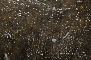 Boya damlalarıyla kaplı soyut beton arkaplan