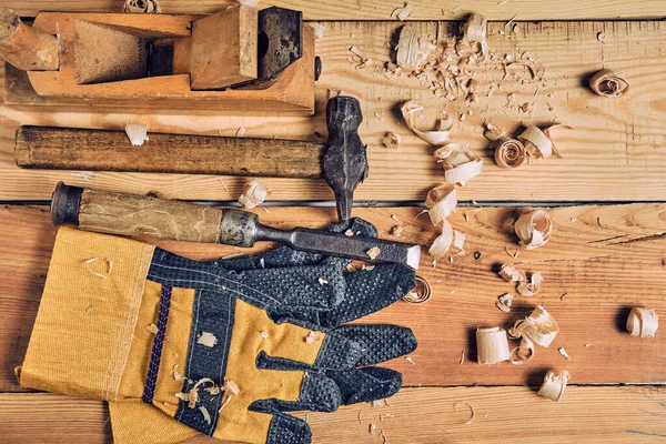 Carpenters Tool Kit Hammer Chisel Plane Gloves Wooden Background — Stock Photo, Image