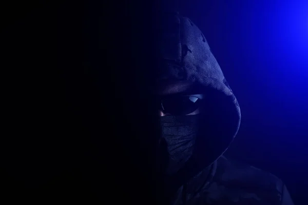 Stylish Man Dark Hoodie Black Glasses Mask Dark Background Blue — Stock fotografie