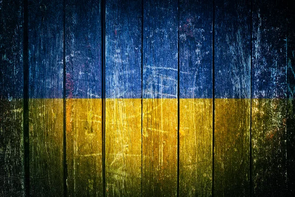 Aged Flag Ukraine Depicted Old Wooden Background — Stockfoto