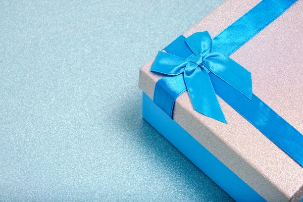 Gift Box Turquoise Background Tied Blue Ribbon Bow — Foto de Stock