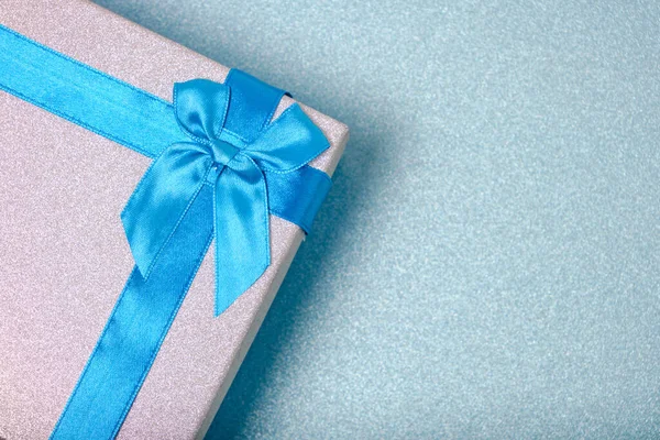 Gift Box Turquoise Background Tied Blue Ribbon Bow — Foto de Stock