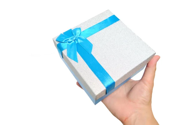 Gift Box Blue Ribbon Bow Hand White Background — Fotografia de Stock