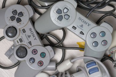 Kostanay, Kazakhstan 2022. Old gamepads for retro sony playstation game console