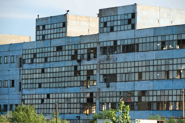 Old, abandoned, crumbling building industrial plant