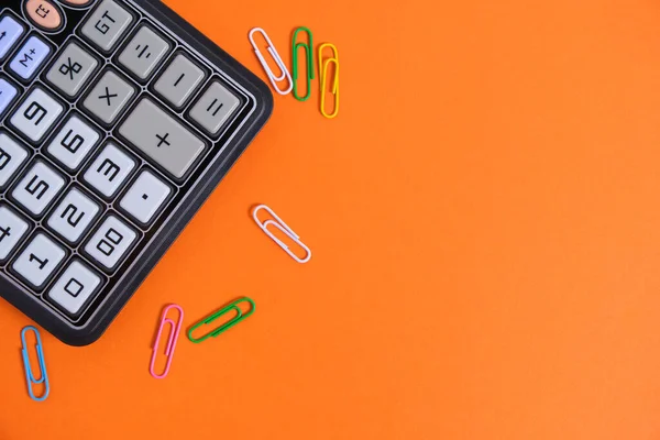 Calculator Colorful Paper Clips Orange Background School Supplies — Stockfoto