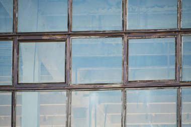 Old glass facade abandoned building