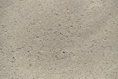 Abstract background, gray concrete pavement texture closeup