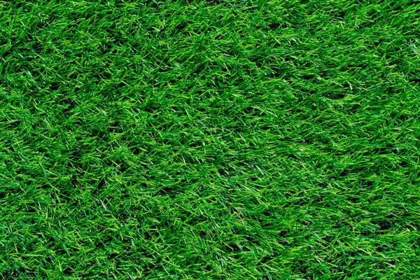 Abstract background, texture green grass and artificial lawn