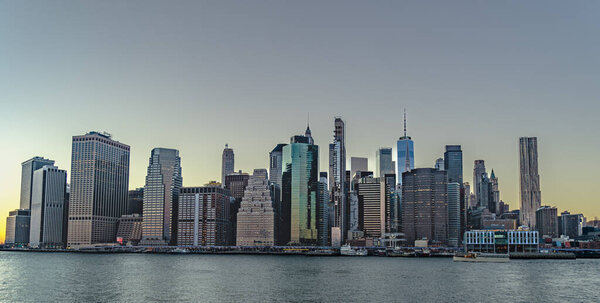 NYC,New York,USA- February 22,2022: Panoramic view of Manhattan skyline shot during golden hours .