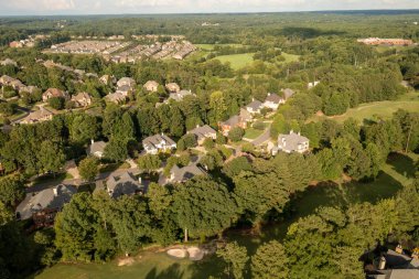 Aerial panoramic view of house cluster in a sub division in Suburbs in Georgia ,USA shot by drone shot during golden hour in HDR