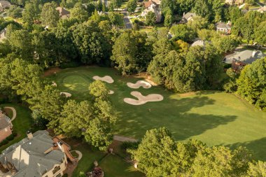 Aerial panoramic view of house cluster in a sub division in Suburbs in Georgia ,USA shot by drone shot during golden hour in HDR