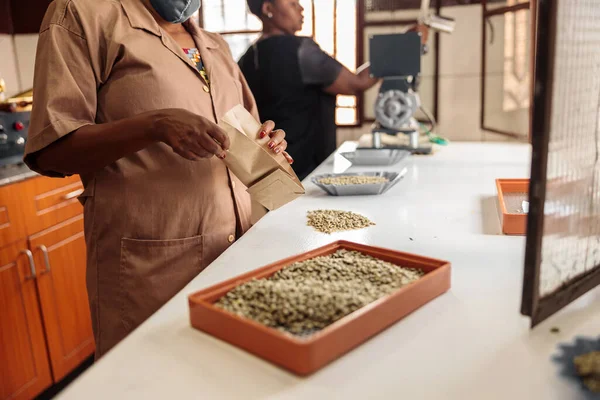 Cropped Photo African American Female Worker Putting Grain Bag Factory — Stock Photo, Image