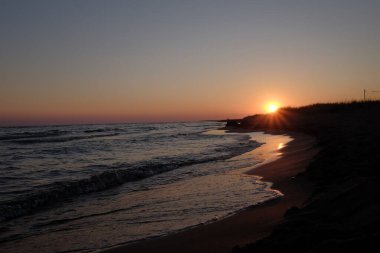 Sahilde gün batımı