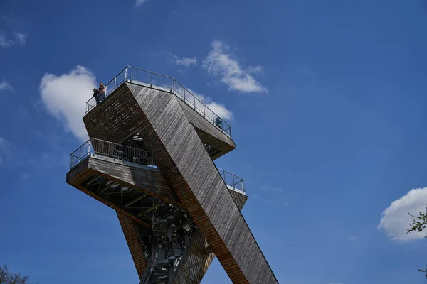 Salas, Czech Republic - April 17, 2022 - A completely unconventional tourist lookout tower above the village of Sala in the foothills of the Chriby Mountains.                                 
