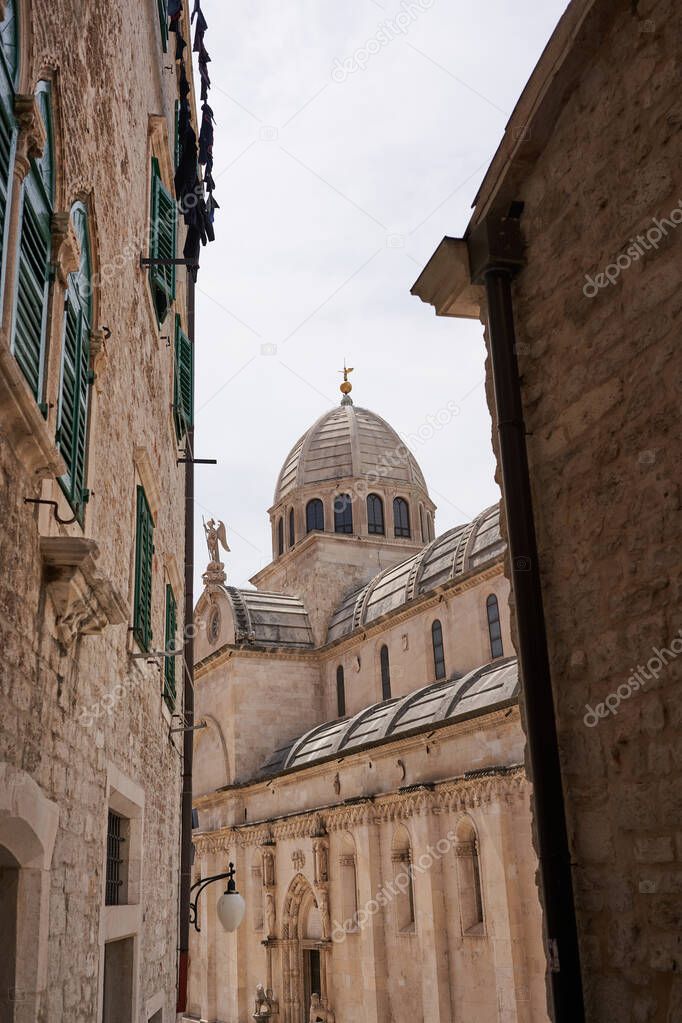 Sibenik, Croatia - May 26, 2022, The Cathedral of St. James (Croatian: Katedrala sv. Jakova) is a triple-nave basilica with three apses and a dome in the city of Sibenik                               