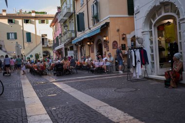 Bardolino, Italy - July 11, 2022 - the historic center of Bardolino on Lake Garda on a summer afternoon                               