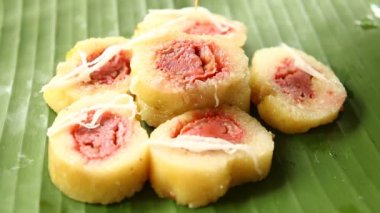 Bananas with Sticky Rice  or Khao Tom Pad , Thai famous dessert .