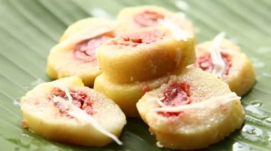 Bananas with Sticky Rice  or Khao Tom Pad , Thai famous dessert .