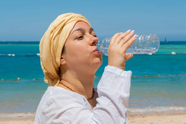 Beautiful Year Old Woman Drinks Water Plastic Bottle Background Sea — Stock Photo, Image