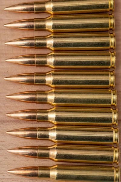 Row Cartridges Caliber Bullets Kalashnikov Assault Rifle Textured Background Close — стоковое фото